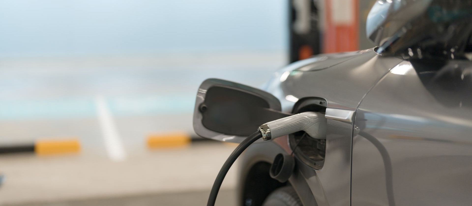 Closeup of EV charging in garage