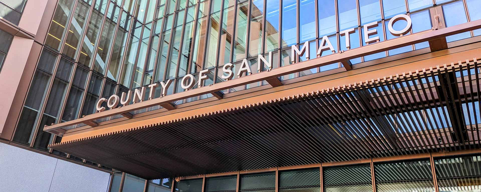 San Mateo County government office building exterior sign over entrance